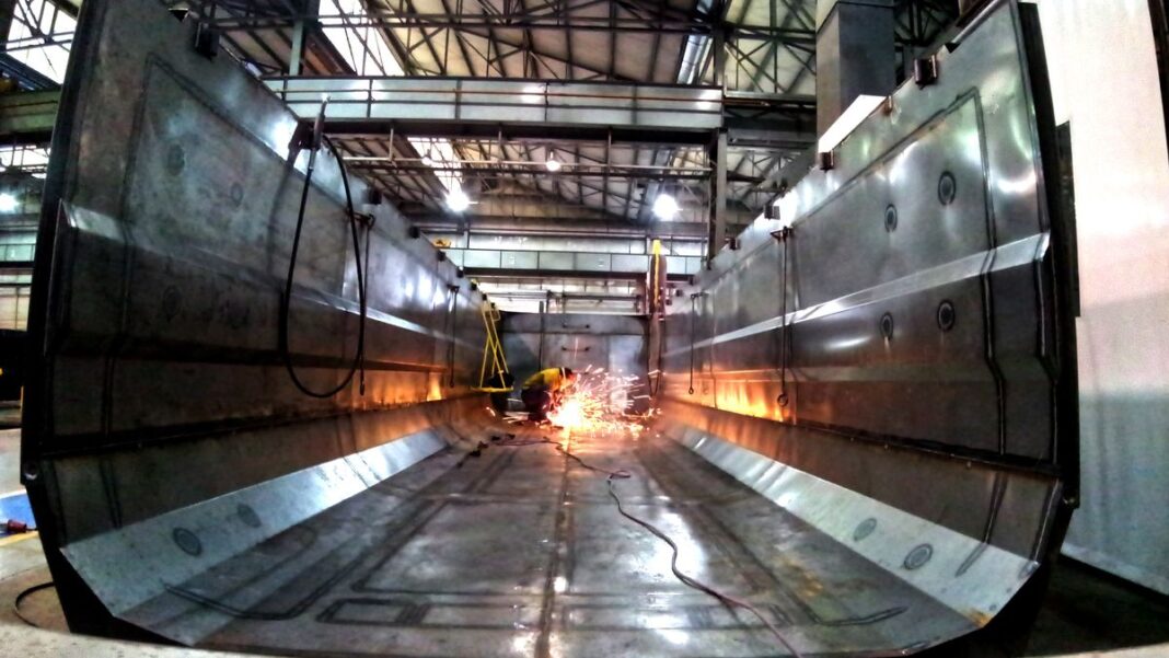 Gráfico de evolución de indicadores económicos sobre un mapa de la provincia de Santa Fe